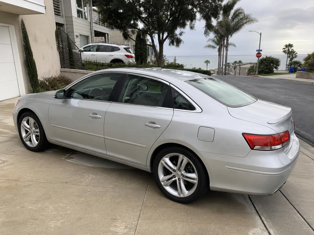 Gleaming white car exterior after professional detailing