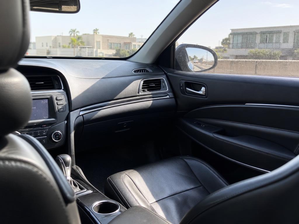 Clean detailed car interior with leather seats and dashboard